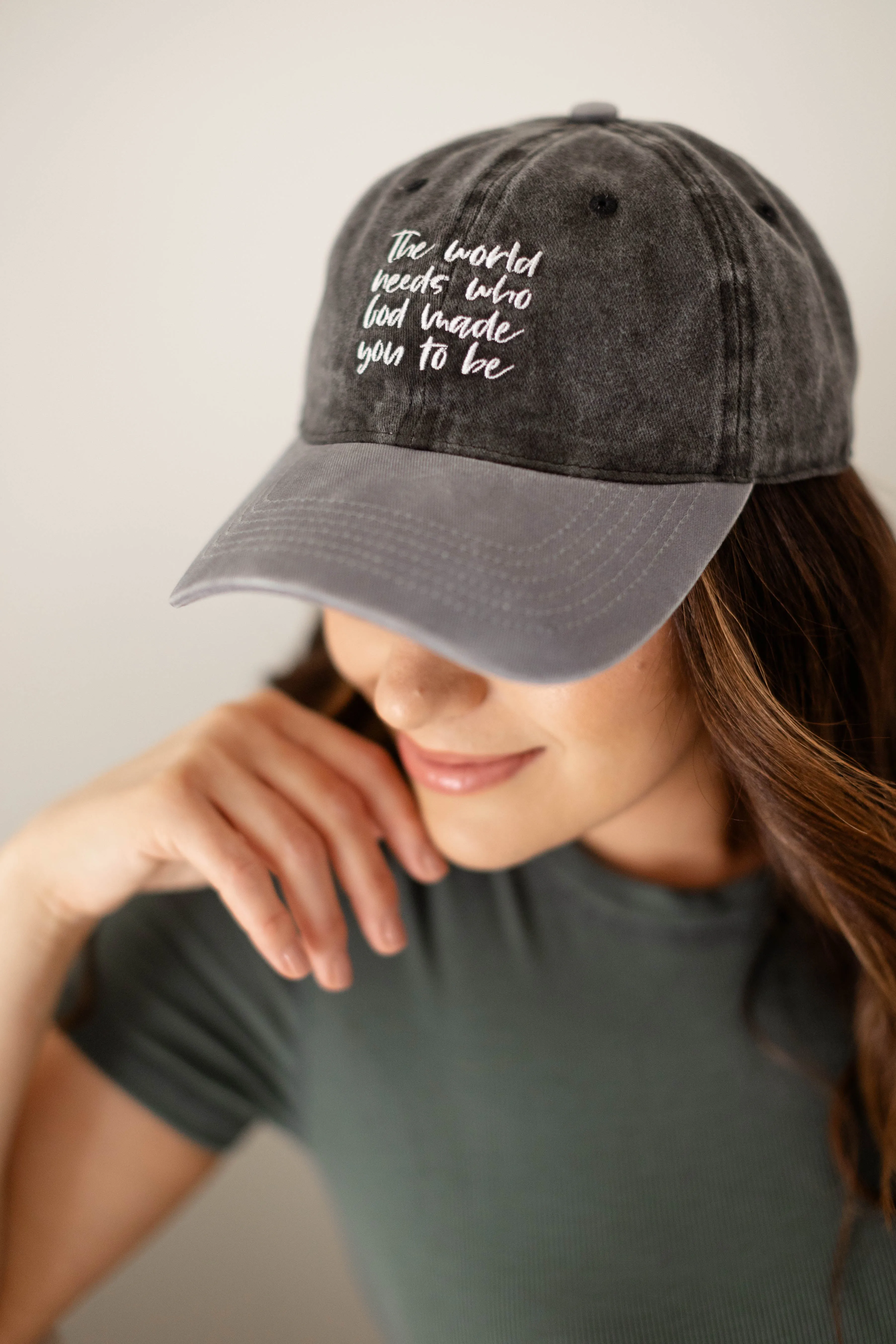 'The World Needs' Baseball Cap in Washed Black